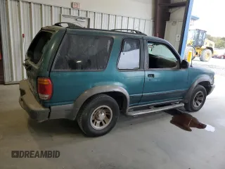 1998 Ford Explorer Sport with VIN 1FMYU22X4WUB36948, listed as a Copart auction lot 76699374 with 266,977 mi miles and Salvage title. Bid and sale history available at DreamBid. Image 3.