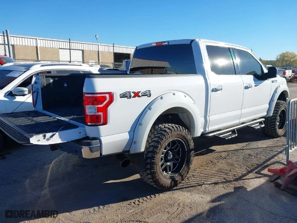 2018 Ford F-150 XL with VIN 1FTEW1E56JKE31477, listed as a IAAI auction lot 40838451 with 75,325 mi miles. Bid and sale history available at carsss.com. Image 4.