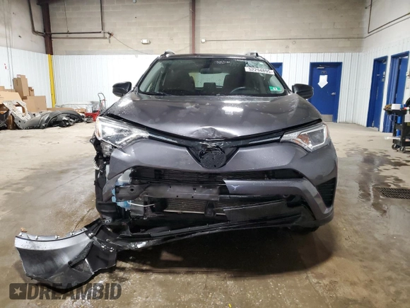 2016 Toyota RAV4 LE with VIN JTMBFREV7GJ071569, listed as a Copart auction lot 52294895 with 60,725 mi miles and Salvage Title. Bid and sale history available at DreamBid. Image 5.