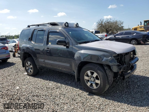 2011 Nissan Xterra S with VIN 5N1AN0NW5BC511218, listed as a Copart auction lot 61609915 with 207,550 mi miles and Salvage title. Bid and sale history available at DreamBid. Image 4.