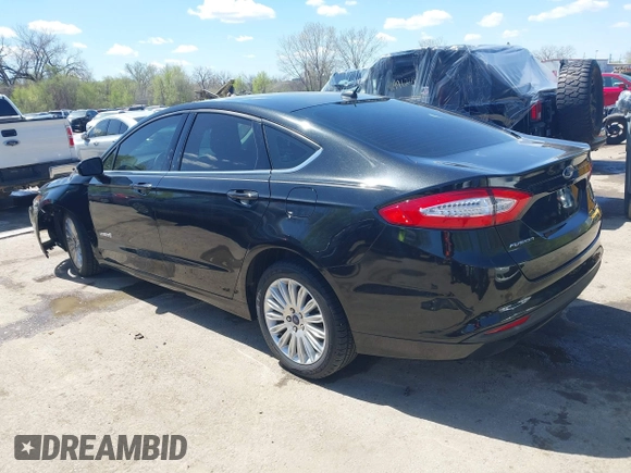 2014 Ford Fusion SE Hybrid with VIN 3FA6P0LU4ER252089, listed as a IAAI auction lot 41982070 with 47,512 mi miles. Bid and sale history available at carsss.com. Image 3.