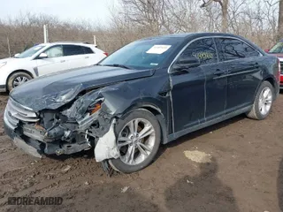 2014 Ford Taurus SEL with VIN 1FAHP2E88EG149396, listed as a IAAI auction lot 41489410 with 190,648 mi miles. Bid and sale history available at carsss.com. Image 6.