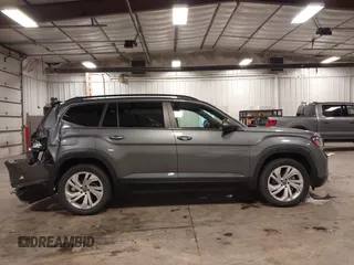 2021 Volkswagen Atlas SE z VIN 1V2KR2CA5MC606590, wystawiony jako IAAI lot #42383813 z przebiegiem 45 087 mil mil oraz . Historia ofert i sprzedaży dostępna na DreamBid. Obrazek 13.