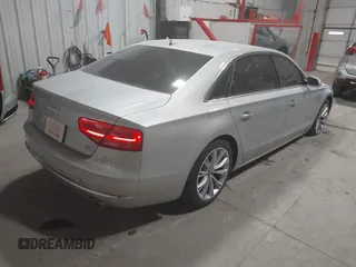 2011 Audi A8 with VIN WAURVAFD5BN014214, listed as a IAAI auction lot 41396044 with 131,764 mi miles and . Bid and sale history available at DreamBid. Image 4.