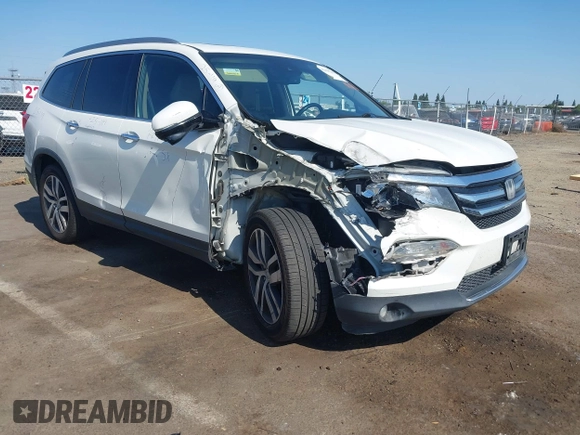 2018 Honda Pilot Touring with VIN 5FNYF6H95JB019122, listed as a IAAI auction lot 42439283 with 128,848 mi miles and . Bid and sale history available at DreamBid. Image 1.
