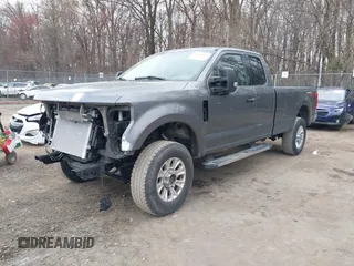 2021 Ford Super Duty F-250 SRW XL with VIN 1FT7X2B63MEC04131, listed as a IAAI auction lot 41864148 with 129,452 mi miles. Bid and sale history available at carsss.com. Image 2.