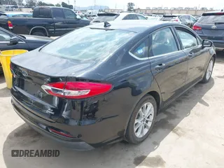 2020 Ford Fusion SE z VIN 3FA6P0LU7LR170922, wystawiony jako IAAI lot #42121025 z przebiegiem 115 799 mil mil oraz . Historia ofert i sprzedaży dostępna na DreamBid. Obrazek 4.