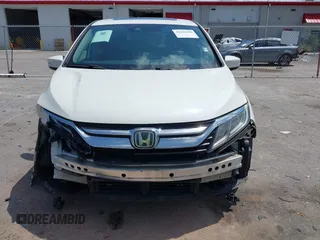 2018 Honda Odyssey EX-L z VIN 5FNRL6H76JB111027, wystawiony jako IAAI lot #42234196 z przebiegiem 88 855 mil mil oraz . Historia ofert i sprzedaży dostępna na DreamBid. Obrazek 6.