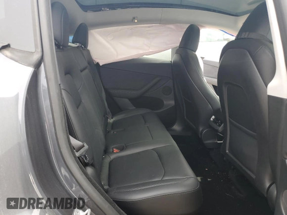 2023 Tesla Model Y Long Range z VIN 7SAYGDEE3PF884220, wystawiony jako Copart lot #52072605 z przebiegiem 44 996 mil mil oraz Czysty tytuł • Clean title. Historia ofert i sprzedaży dostępna na DreamBid. Obrazek 10.