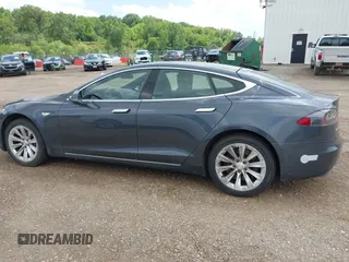 2016 Tesla Model S 90D with VIN 5YJSA1E25GF129482, listed as a IAAI auction lot 42588913 with 101,790 mi miles and . Bid and sale history available at DreamBid. Image 14.