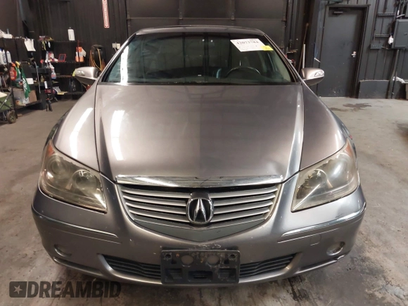 2006 Acura RL z VIN JH4KB165X6C009547, wystawiony jako IAAI lot #42073784 z przebiegiem 190 601 mil mil oraz . Historia ofert i sprzedaży dostępna na DreamBid. Obrazek 13.
