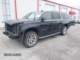 2015 GMC Yukon XL SLT with VIN 1GKS2HKC6FR746809, listed as a IAAI auction lot 41559570 with 144,401 mi miles. Bid and sale history available at carsss.com. Image 18.