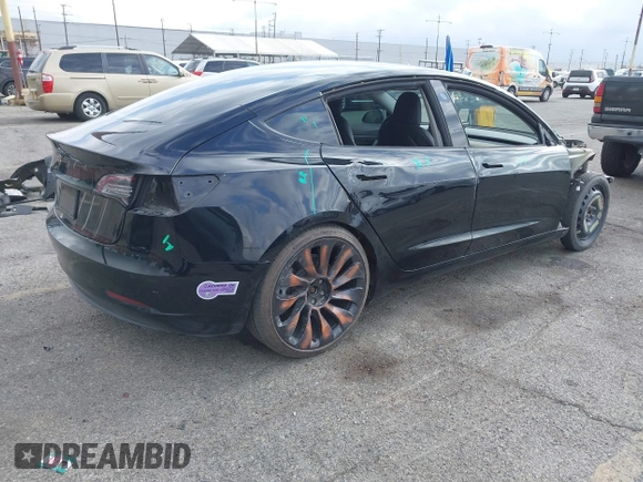 2019 Tesla Model 3 Mid Range with VIN 5YJ3E1EA3KF415601, listed as a IAAI auction lot 42125393 with 150,220 mi miles and . Bid and sale history available at carsss.com. Image 4.