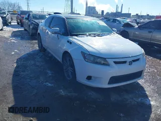 2012 Scion tC with VIN JTKJF5C70C3031365, listed as a IAAI auction lot 41607290 with 241,183 mi miles. Bid and sale history available at carsss.com. Image 1.