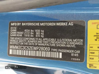 2014 MINI Countryman S with VIN WMWZC3C52EWP28069, listed as a IAAI auction lot 42026583 with 137,342 mi miles and . Bid and sale history available at DreamBid. Image 9.