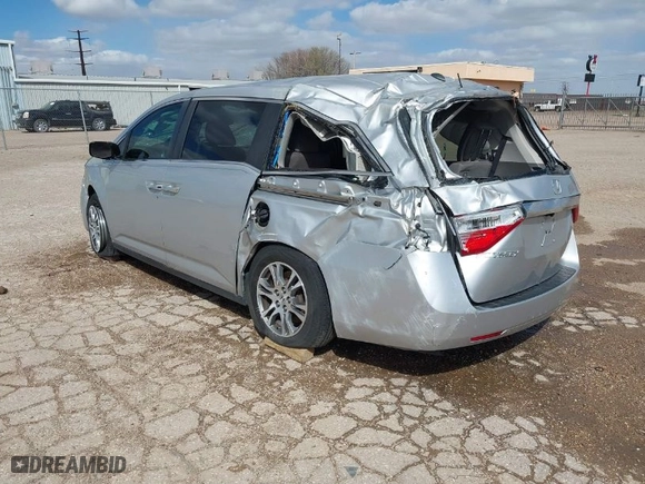 2012 Honda Odyssey EX-L with VIN 5FNRL5H64CB136514, listed as a IAAI auction lot 41837755 with 175,844 mi miles. Bid and sale history available at carsss.com. Image 3.