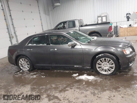 2014 Chrysler 300 C with VIN 2C3CCAKG8EH345577, listed as a IAAI auction lot 41719373 with 152,081 mi miles and . Bid and sale history available at carsss.com. Image 13.