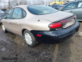 1999 Ford Taurus SE with VIN 1FAFP53U3XA131984, listed as a IAAI auction lot 41638566 with 84,836 mi miles. Bid and sale history available at carsss.com. Image 3.