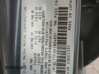 2013 Mazda 3 i SV z VIN JM1BL1TFXD1804831, wystawiony jako Copart lot #60029405 z przebiegiem 83 633 mil mil oraz Szkoda całkowita • Salvage title. Historia ofert i sprzedaży dostępna na DreamBid. Obrazek 12.
