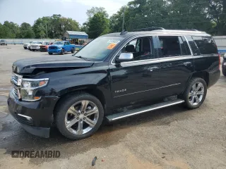 2016 Chevrolet Tahoe LTZ with VIN 1GNSCCKCXGR264655, listed as a Copart auction lot 57456625 with 237,621 mi miles and Salvage title. Bid and sale history available at DreamBid. Image 1.