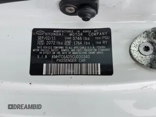 2012 Hyundai Veloster w/Red Int with VIN KMHTC6AD5CU030340, listed as a Copart auction lot 45793405 with 139,667 mi miles and Clean title. Bid and sale history available at DreamBid. Image 12.