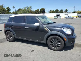 2013 MINI Countryman S ALL4 with VIN WMWZC5C52DWP30625, listed as a Copart auction lot 62772395 with 129,498 mi miles and Salvage title. Bid and sale history available at DreamBid. Image 4.