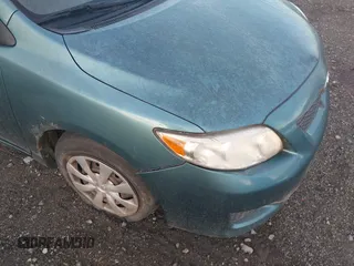 2009 Toyota Corolla with VIN JTDBL40E099063708, listed as a IAAI auction lot 42085584 with 110,075 mi miles. Bid and sale history available at carsss.com. Image 6.