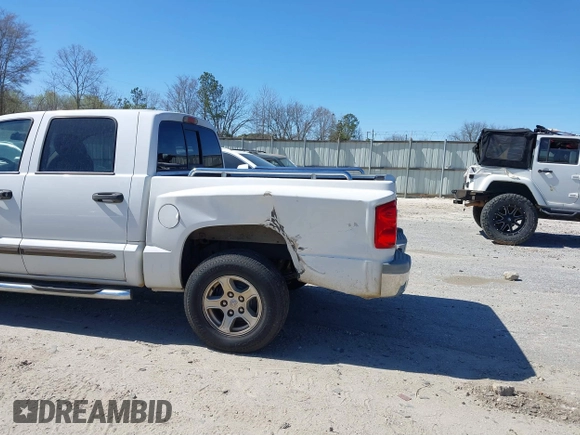 2006 Dodge Dakota SLT with VIN 1D7HE48N86S639435, listed as a IAAI auction lot 41863389 with 173,248 mi miles and . Bid and sale history available at carsss.com. Image 6.