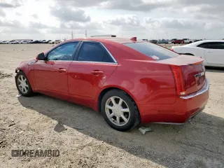 2009 Cadillac CTS RWD with VIN 1G6DF577290146965, listed as a Copart auction lot 56075905 with 212,119 mi miles and Salvage title. Bid and sale history available at DreamBid. Image 2.