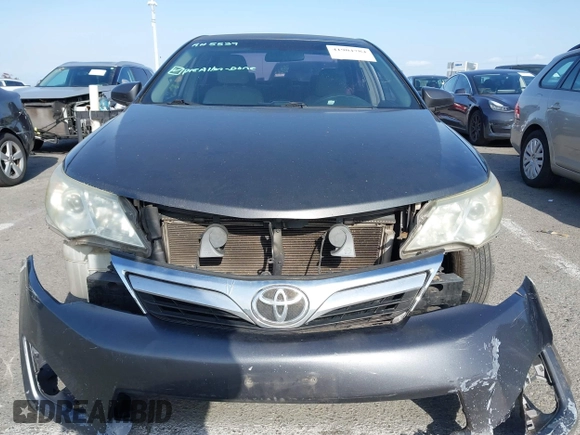2012 Toyota Camry L z VIN 4T4BF1FK2CR211222, wystawiony jako IAAI lot #41904784 z przebiegiem 157 255 mil mil oraz . Historia ofert i sprzedaży dostępna na DreamBid. Obrazek 13.