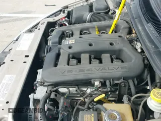 2002 Dodge Intrepid z VIN 2B3AD56M42H297547, wystawiony jako IAAI lot #40503141 z przebiegiem 96 301 mil mil oraz . Historia ofert i sprzedaży dostępna na DreamBid. Obrazek 13.