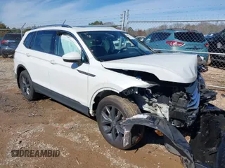 2023 Volkswagen Tiguan SE with VIN 3VVNB7AX8PM028383, listed as a IAAI auction lot 41588135 with 31,231 mi miles and . Bid and sale history available at DreamBid. Image 1.