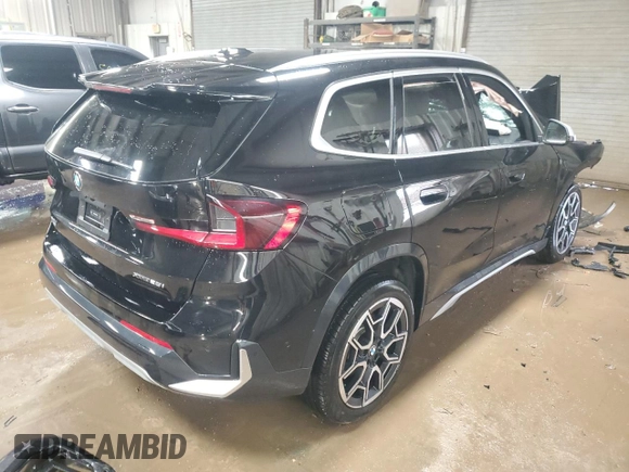 2023 BMW X1 xDrive28i with VIN WBX73EF08P5X85250, listed as a Copart auction lot 50158565 with 7,312 mi miles and Salvage Title. Bid and sale history available at DreamBid. Image 3.