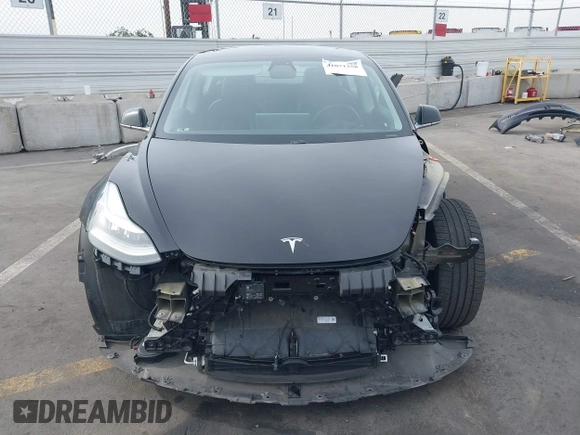 2020 Tesla Model 3 Long Range z VIN 5YJ3E1EB0LF600098, wystawiony jako IAAI lot #41071258 z przebiegiem 149 939 mil mil oraz . Historia ofert i sprzedaży dostępna na DreamBid. Obrazek 13.