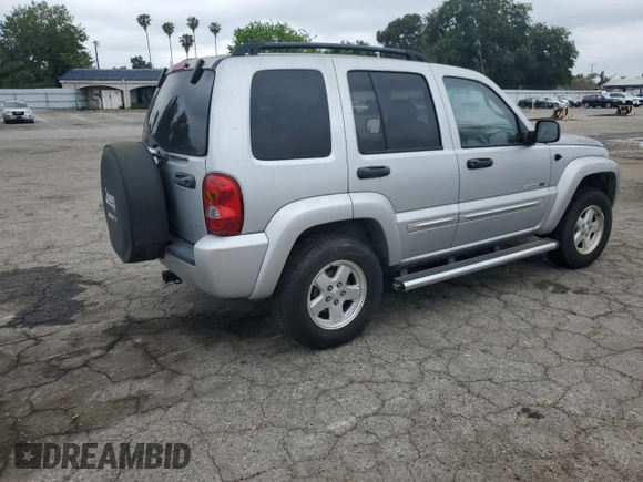 2002 Jeep Liberty Limited with VIN 1J8GK58K52W303098, listed as a Copart auction lot 56005185 with 77,206 mi miles and Clean title. Bid and sale history available at DreamBid. Image 3.