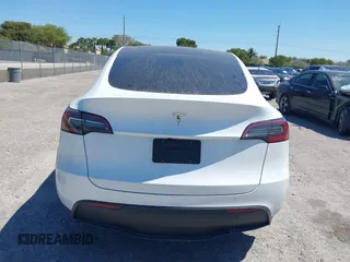 2025 Tesla Model Y Long Range with VIN 7SAYGDED6SF234278, listed as a IAAI auction lot 41781695 with 1,168 mi miles and . Bid and sale history available at DreamBid. Image 15.