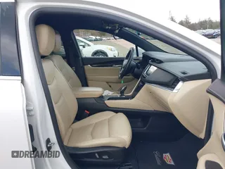 2017 Cadillac XT5 FWD with VIN 1GYKNARS2HZ310866, listed as a IAAI auction lot 41865458 with 70,375 mi miles. Bid and sale history available at carsss.com. Image 5.
