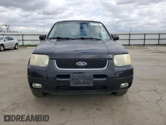 2004 Ford Escape Limited with VIN 1FMCU04134KA61949, listed as a Copart auction lot 47377455 with 205,480 mi miles and Salvage title. Bid and sale history available at DreamBid. Image 5.