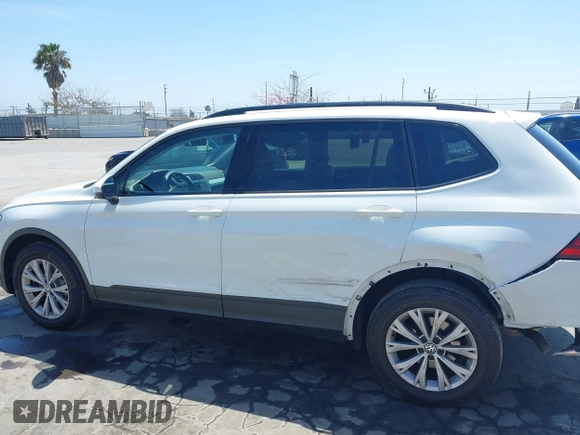 2019 Volkswagen Tiguan S with VIN 3VV1B7AX1KM101407, listed as a IAAI auction lot 42032761 with 51,868 mi miles and . Bid and sale history available at DreamBid. Image 14.