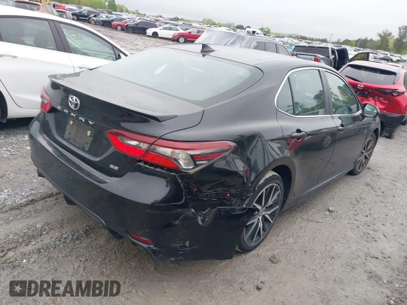 2021 Toyota Camry SE Nightshade with VIN 4T1G11AK2MU456447, listed as a IAAI auction lot 41973852 with 47,185 mi miles. Bid and sale history available at carsss.com. Image 4.