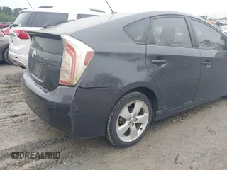 2013 Toyota Prius One with VIN JTDKN3DUXD5566488, listed as a IAAI auction lot 41989353 with 197,444 mi miles and . Bid and sale history available at DreamBid. Image 6.