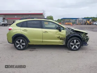 2014 Subaru Crosstrek Touring with VIN JF2GPBKC0EH279005, listed as a IAAI auction lot 42286421 with 99,720 mi miles and . Bid and sale history available at DreamBid. Image 13.