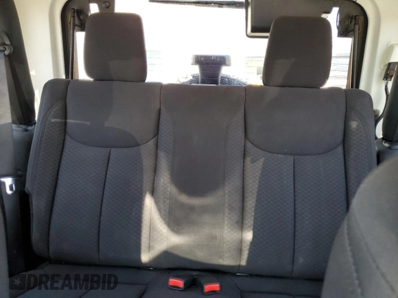 2014 Jeep Wrangler Sport with VIN 1C4AJWAG2EL113843, listed as a Copart auction lot 62771115 with 70,089 mi miles and Salvage title. Bid and sale history available at DreamBid. Image 10.