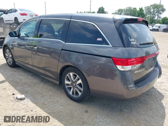 2014 Honda Odyssey Touring with VIN 5FNRL5H99EB138952, listed as a IAAI auction lot 42538833 with 146,959 mi miles and . Bid and sale history available at DreamBid. Image 3.