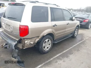 2005 Honda Pilot EX-L with VIN 5FNYF18545B052618, listed as a IAAI auction lot 41798972 with 250,118 mi miles. Bid and sale history available at carsss.com. Image 4.