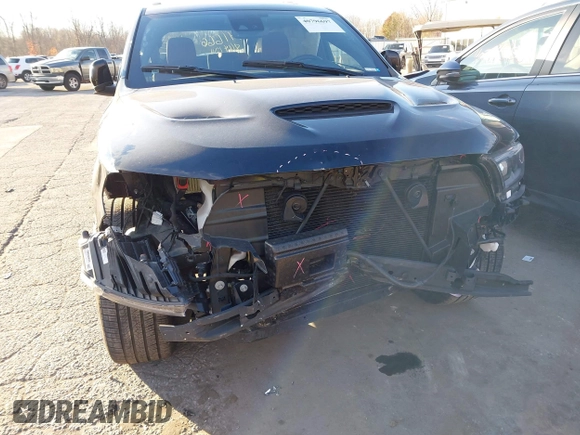 2023 Dodge Durango SRT 392 Premium with VIN 1C4SDJGJ9PC693449, listed as a IAAI auction lot 40796697 with 4,633 mi miles and . Bid and sale history available at DreamBid. Image 6.