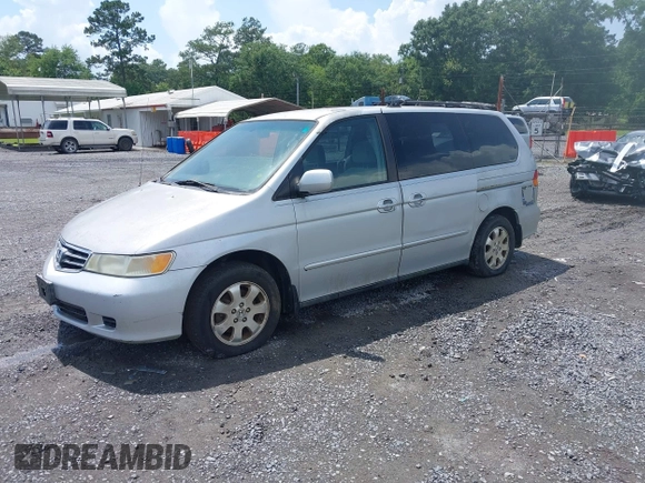2002 Honda Odyssey EX z VIN 2HKRL18692H526842, wystawiony jako IAAI lot #42495810 z przebiegiem 220 289 mil mil oraz . Historia ofert i sprzedaży dostępna na DreamBid. Obrazek 2.
