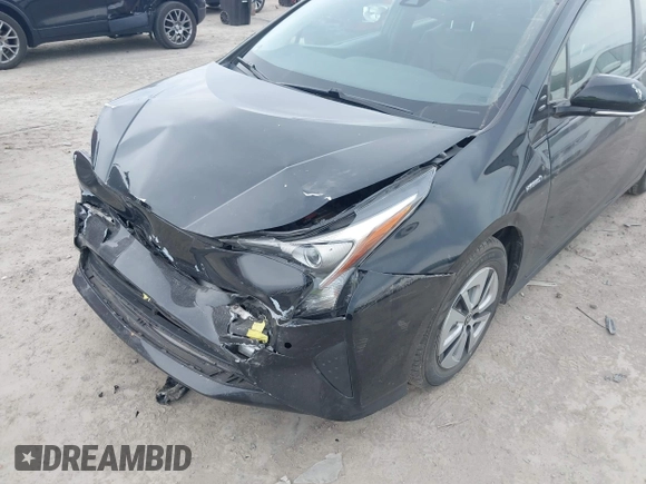 2017 Toyota Prius Two with VIN JTDKARFUXH3041931, listed as a IAAI auction lot 42075004 with 75,768 mi miles and . Bid and sale history available at DreamBid. Image 6.