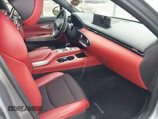 2023 Genesis GV70 Sport z VIN KMUMCDTC9PU093915, wystawiony jako IAAI lot #42147430 z przebiegiem 40 349 mil mil oraz . Historia ofert i sprzedaży dostępna na DreamBid. Obrazek 5.