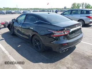 2020 Nissan Maxima SL with VIN 1N4AA6DV5LC366300, listed as a IAAI auction lot 42220939 with 16,858 mi miles and . Bid and sale history available at DreamBid. Image 3.